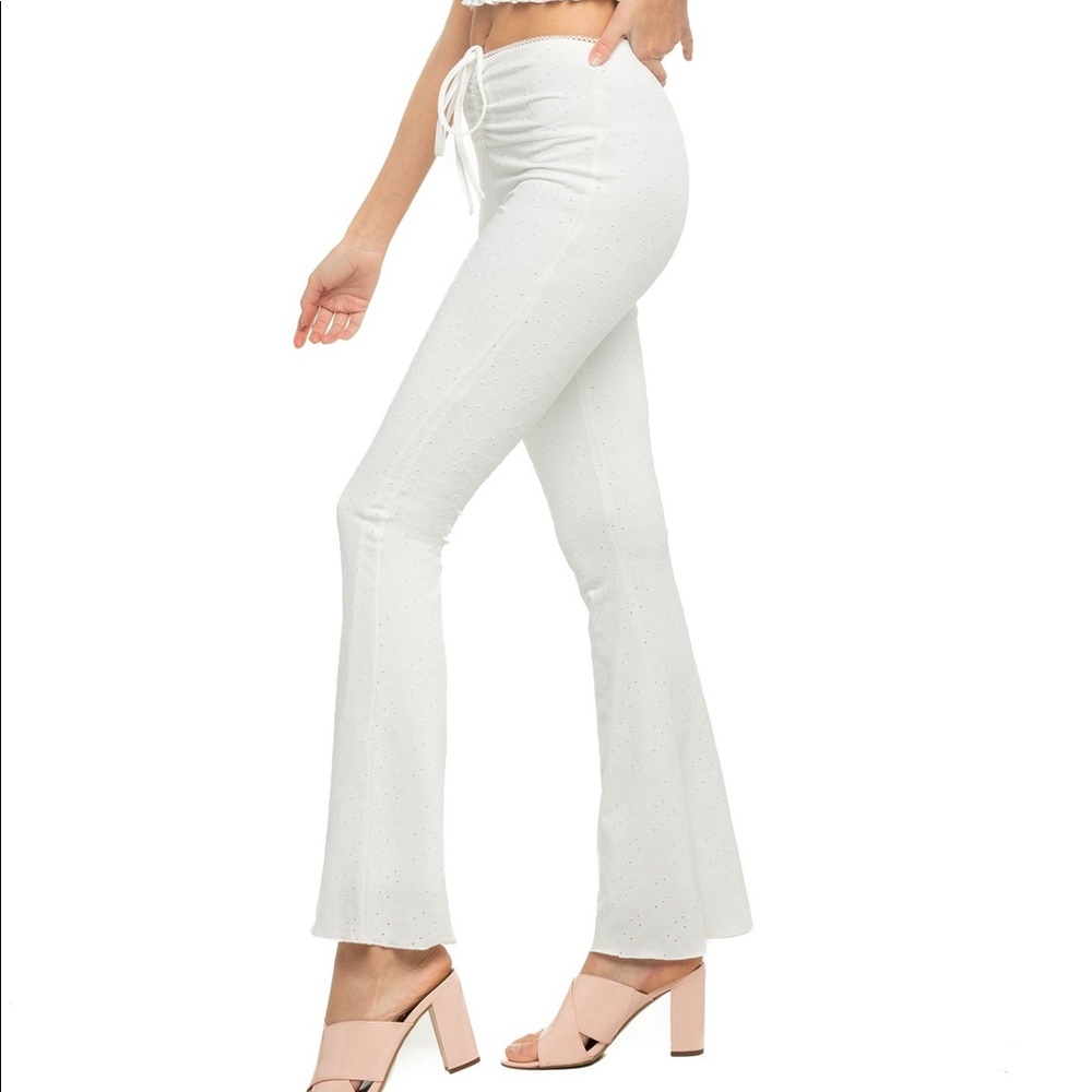 White flare pants